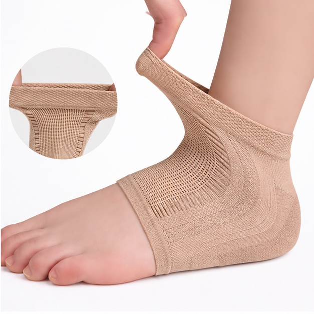 VELORO Gel Heel Sleeves in beige, shown stretched to show the fit